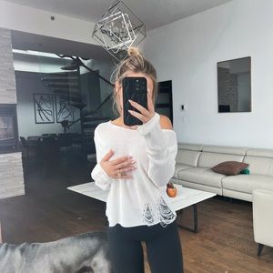 White distressed sweater